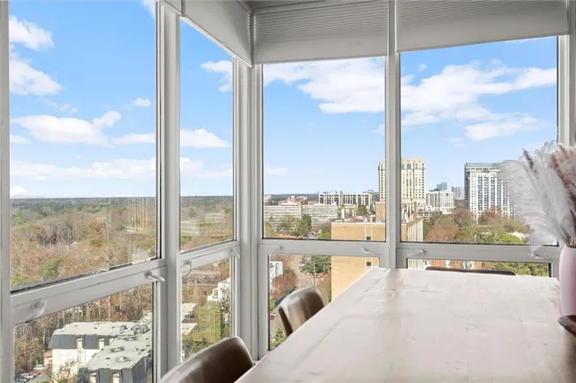 a view of a balcony with wooden floor