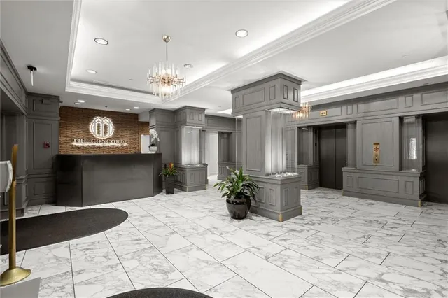 a view of a entryway door of a hall