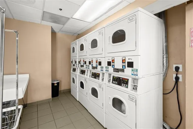 a view of a room with barbeque and wooden floor