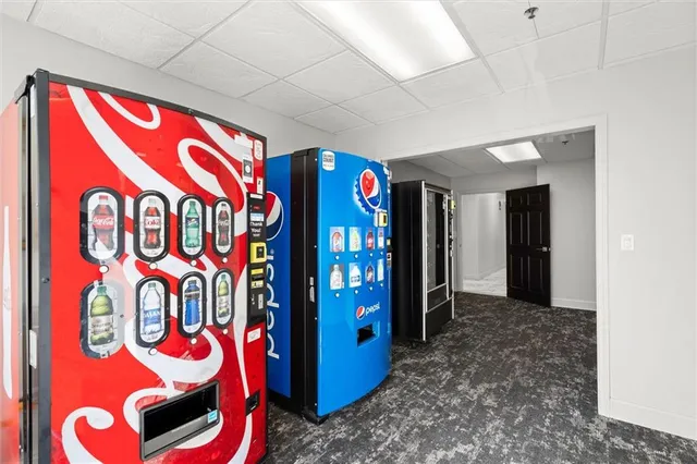 a view of a balcony with two chairs