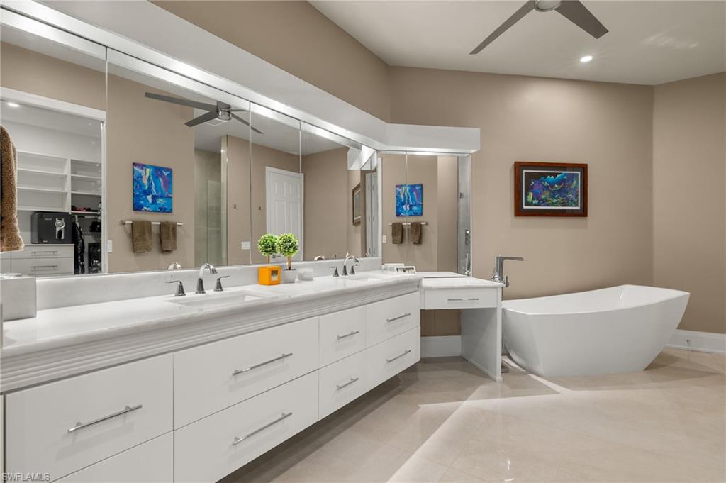 1620 Star Point Lane, Unit 1102 Naples, FL 34112 - Photo 23 of 50 Bedroom featuring access to outside, ceiling fan, and crown molding