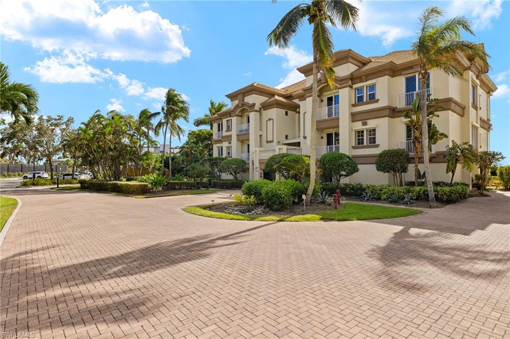 1620 Star Point Lane, Unit 1102 Naples, FL 34112 - Photo 36 of 50 Dock area with a water view