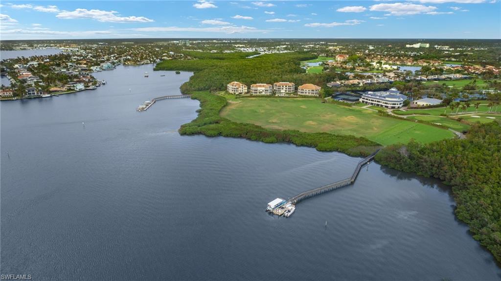 1620 Star Point Lane, Unit 1102 Naples, FL 34112 - Photo 40 of 50 Drone / aerial view with a water view