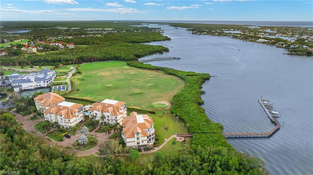 1620 Star Point Lane, Unit 1102 Naples, FL 34112 - Photo 6 of 50 Drone / aerial view with a water view