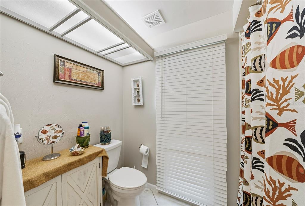 2507 Bluegrass Street Inverness, FL 34453 - Photo 19 of 30 a white toilet sitting next to a bathroom sink