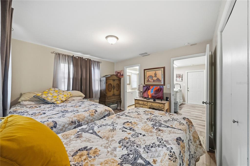 2507 Bluegrass Street Inverness, FL 34453 - Photo 22 of 30 a bedroom with a bed and dresser