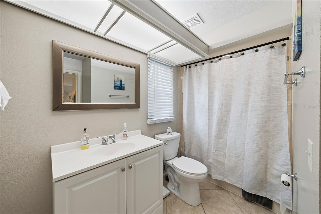 2507 Bluegrass Street Inverness, FL 34453 - Photo 23 of 30 a bathroom with a toilet sink and mirror