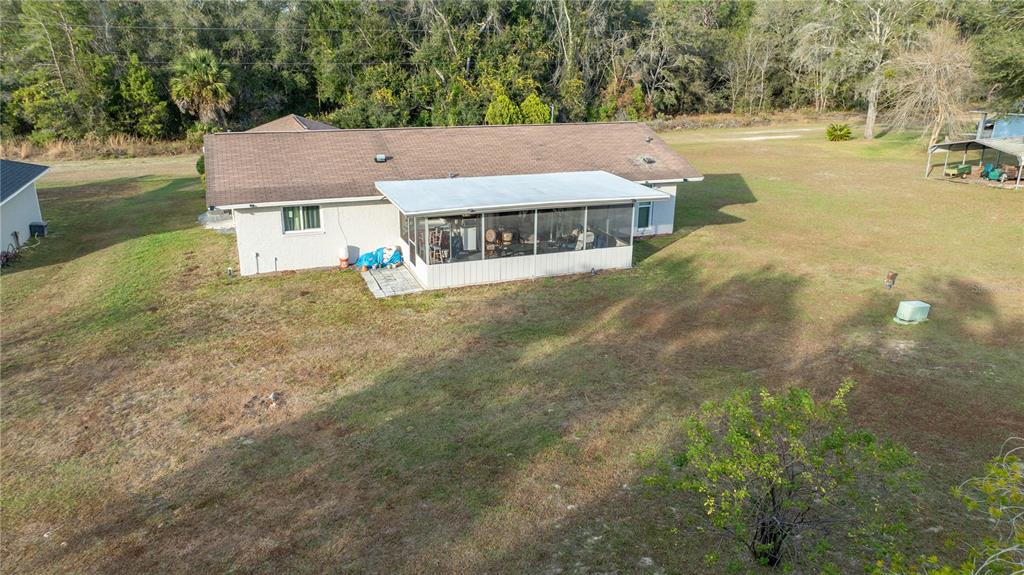 2507 Bluegrass Street Inverness, FL 34453 - Photo 28 of 30 an aerial view of residential houses with outdoor space