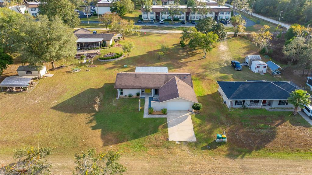 2507 Bluegrass Street Inverness, FL 34453 - Photo 4 of 30 an aerial view of residential houses with outdoor space