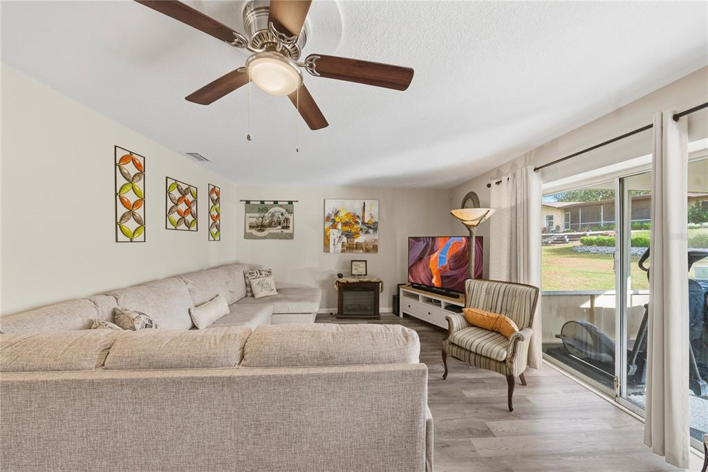 2507 Bluegrass Street Inverness, FL 34453 - Photo 7 of 30 a living room with furniture