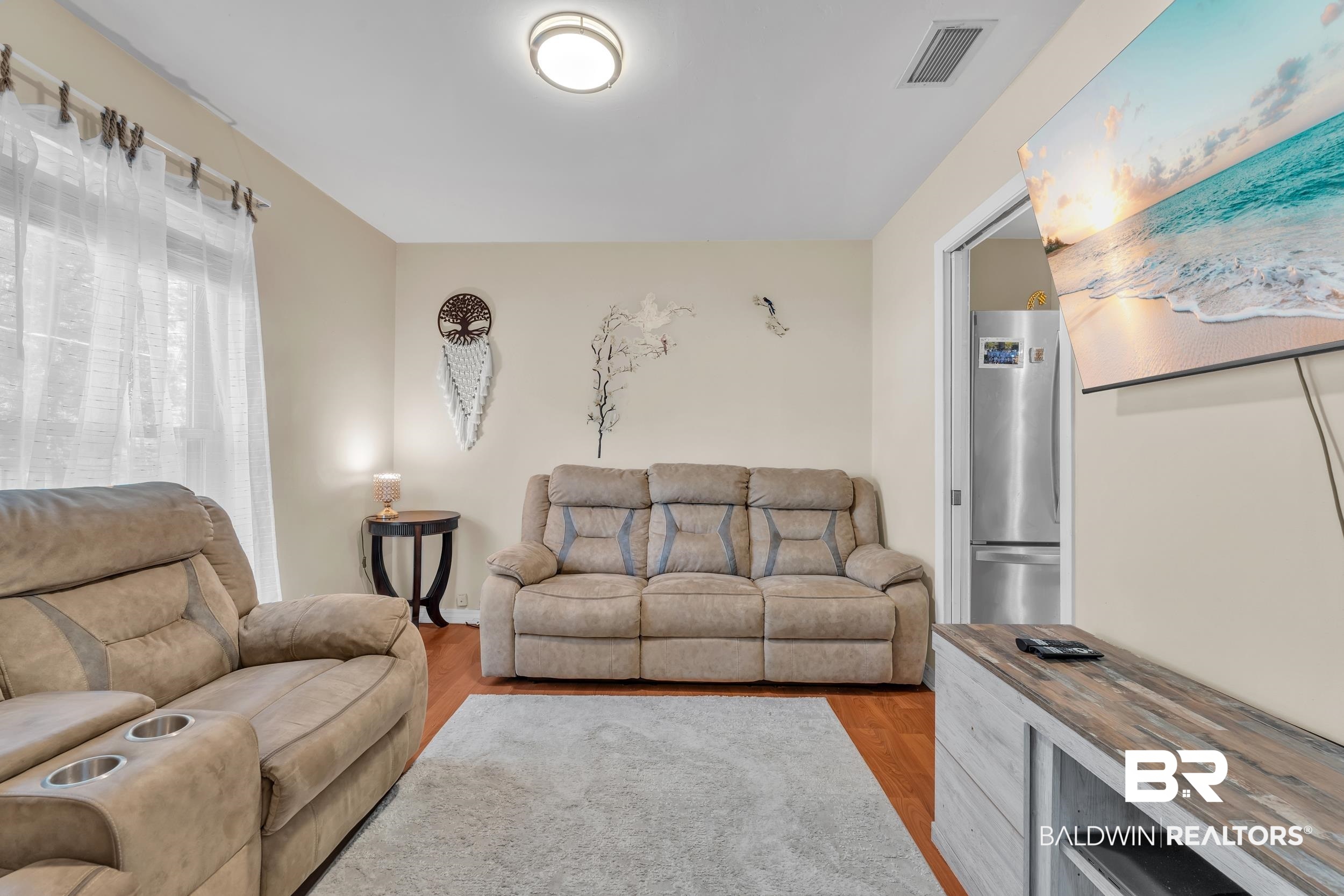 130 Chatam Loop Daphne, AL 36526 - Photo 7 of 26 Living area featuring light wood-type flooring