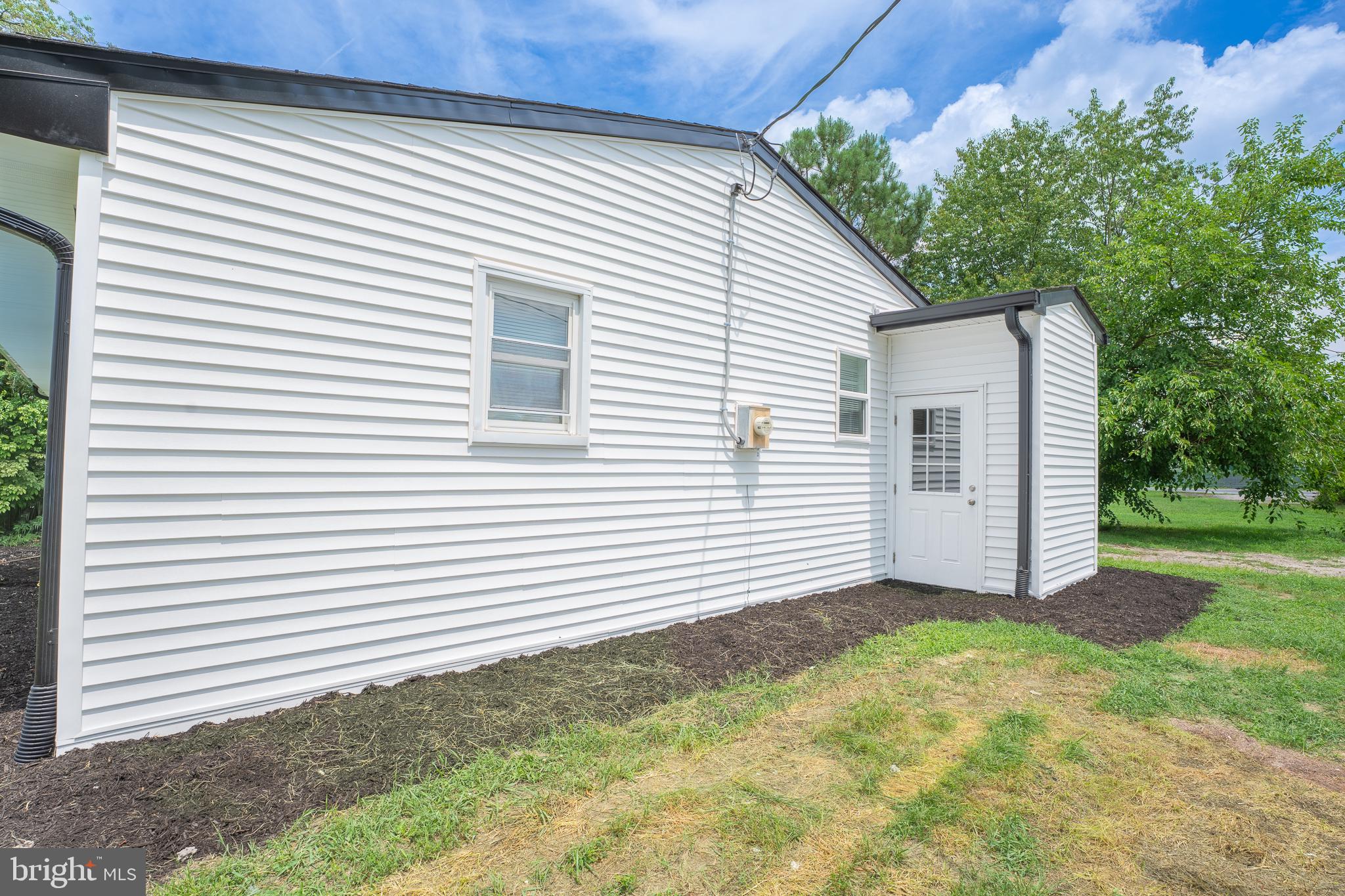 9010 Elks Road Seaford, DE 19973 - Photo 26 of 33 Charming exterior with fresh landscaping.