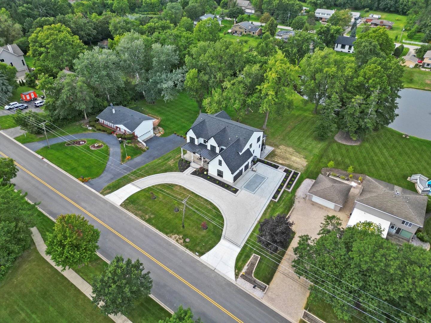 15W670 83rd Street Burr Ridge, IL 60527 - Photo 14 of 96 an aerial view of a house with garden space and street view