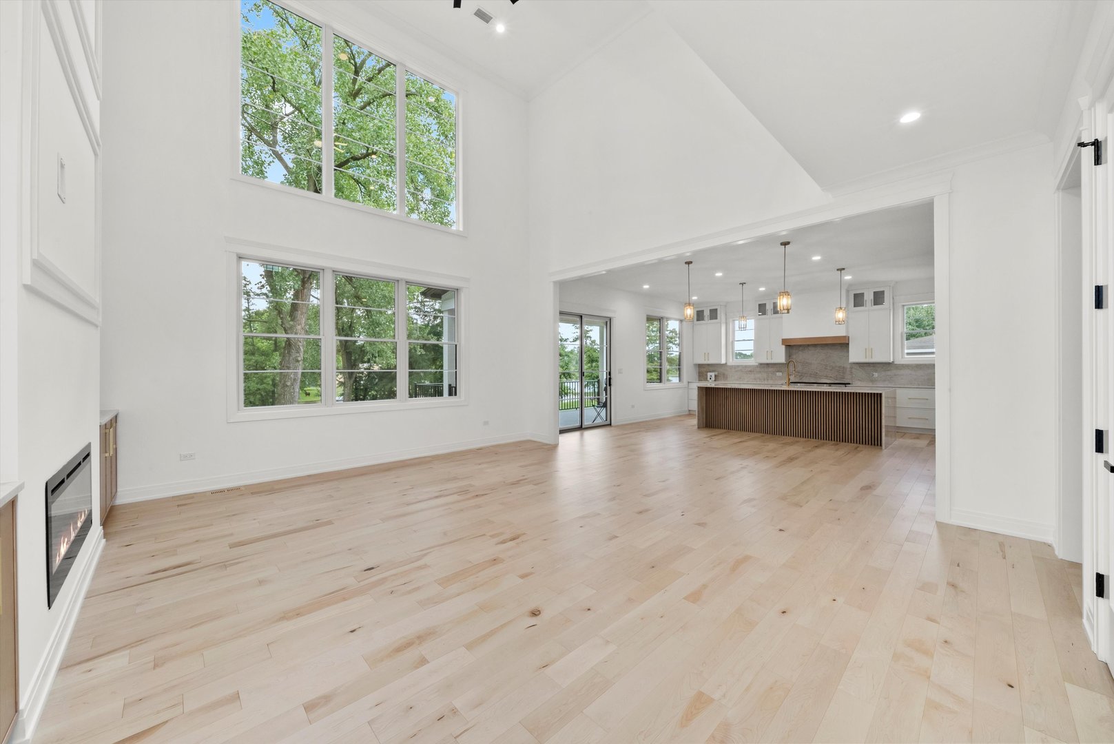 15W670 83rd Street Burr Ridge, IL 60527 - Photo 22 of 96 an empty room with large windows and mountain view