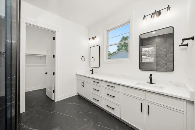 a kitchen with a sink and a window
