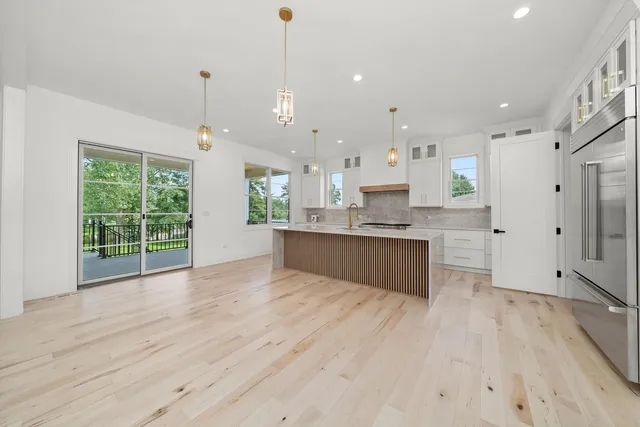 a view of a storage & utility room with two washing machine