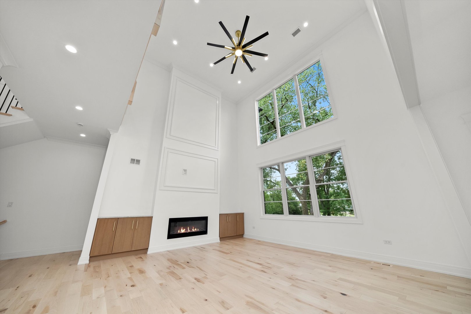 15W670 83rd Street Burr Ridge, IL 60527 - Photo 33 of 96 an empty room with ceiling fan and window