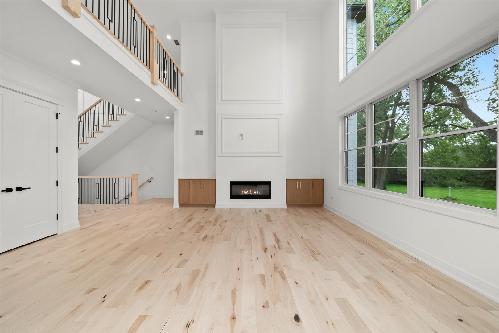 15W670 83rd Street Burr Ridge, IL 60527 - Photo 35 of 96 a view of an empty room with a window and wooden floor