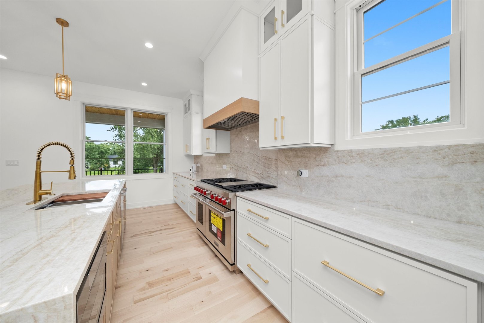 15W670 83rd Street Burr Ridge, IL 60527 - Photo 39 of 96 a kitchen with a sink and a window