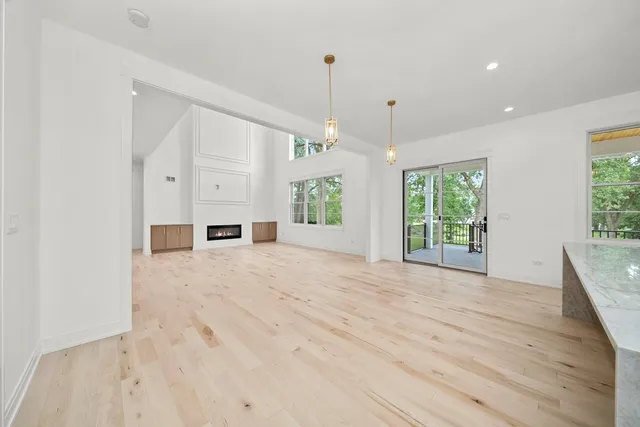 a large bathroom with a granite countertop sink mirror and a bathtub