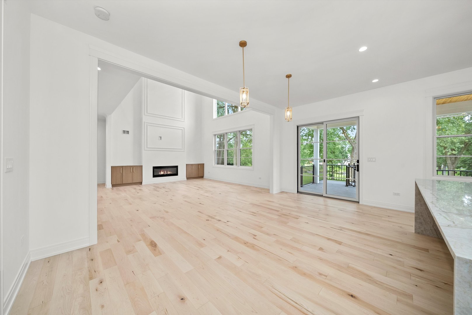 15W670 83rd Street Burr Ridge, IL 60527 - Photo 40 of 96 a view of empty room with wooden floor and fan