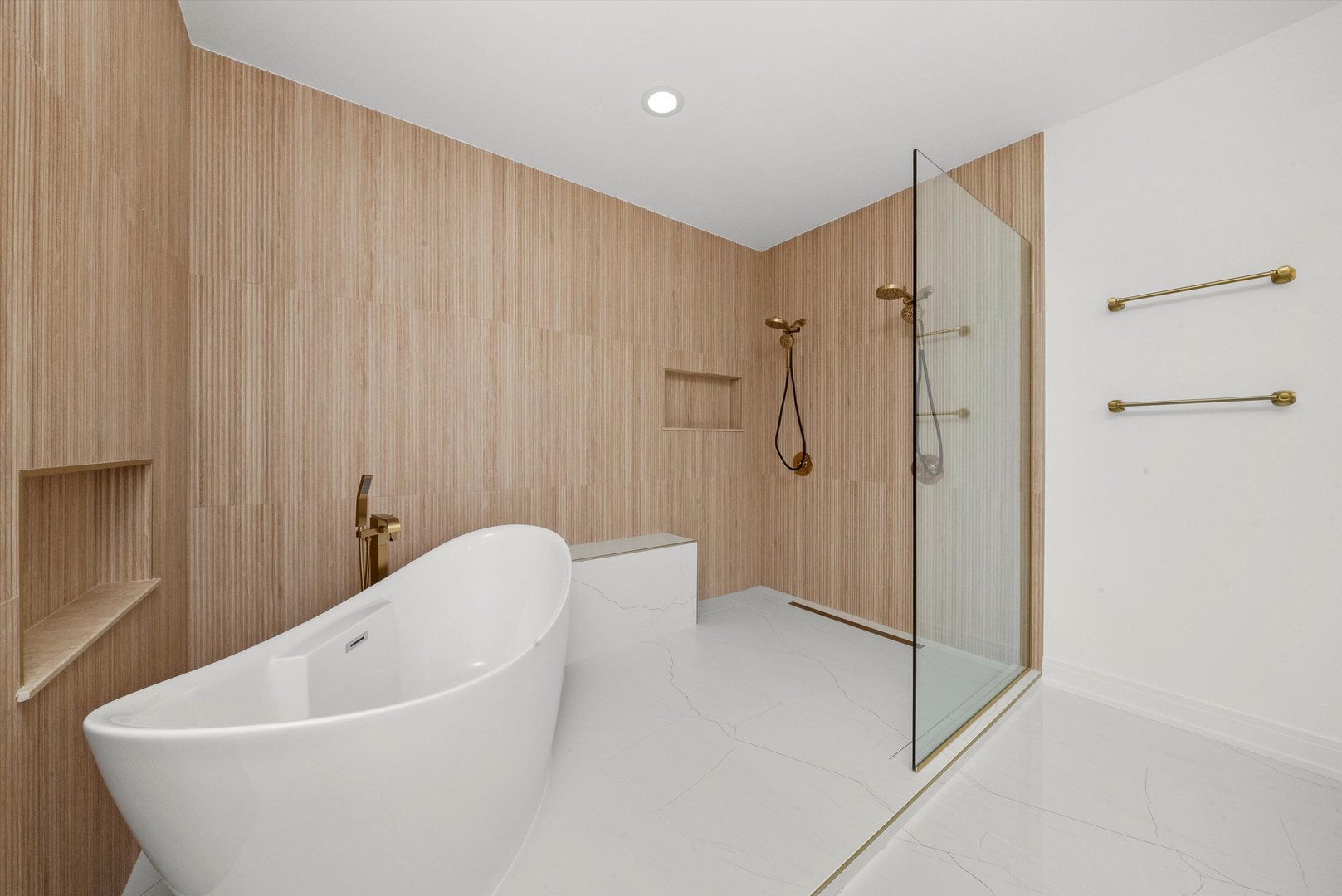 15W670 83rd Street Burr Ridge, IL 60527 - Photo 59 of 96 a bathroom with a tub and shower