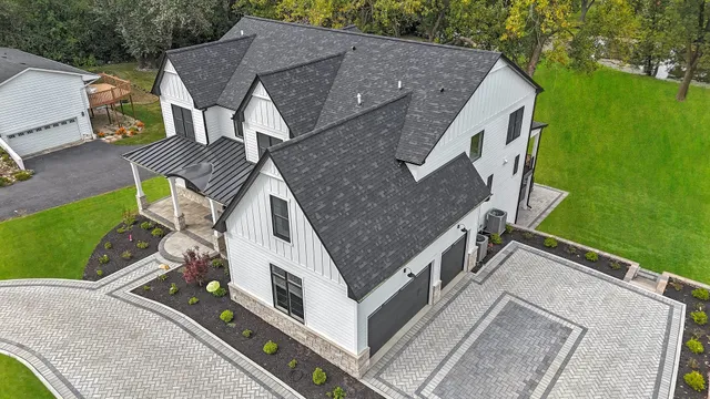 a front view of a house with yard