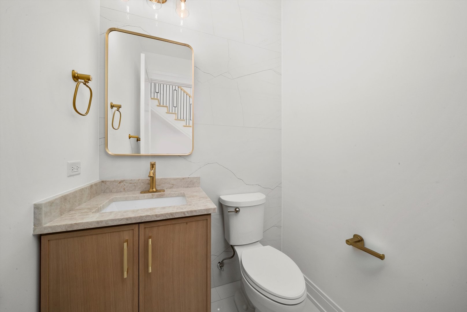 15W670 83rd Street Burr Ridge, IL 60527 - Photo 67 of 96 a bathroom with a toilet sink vanity granite and mirror