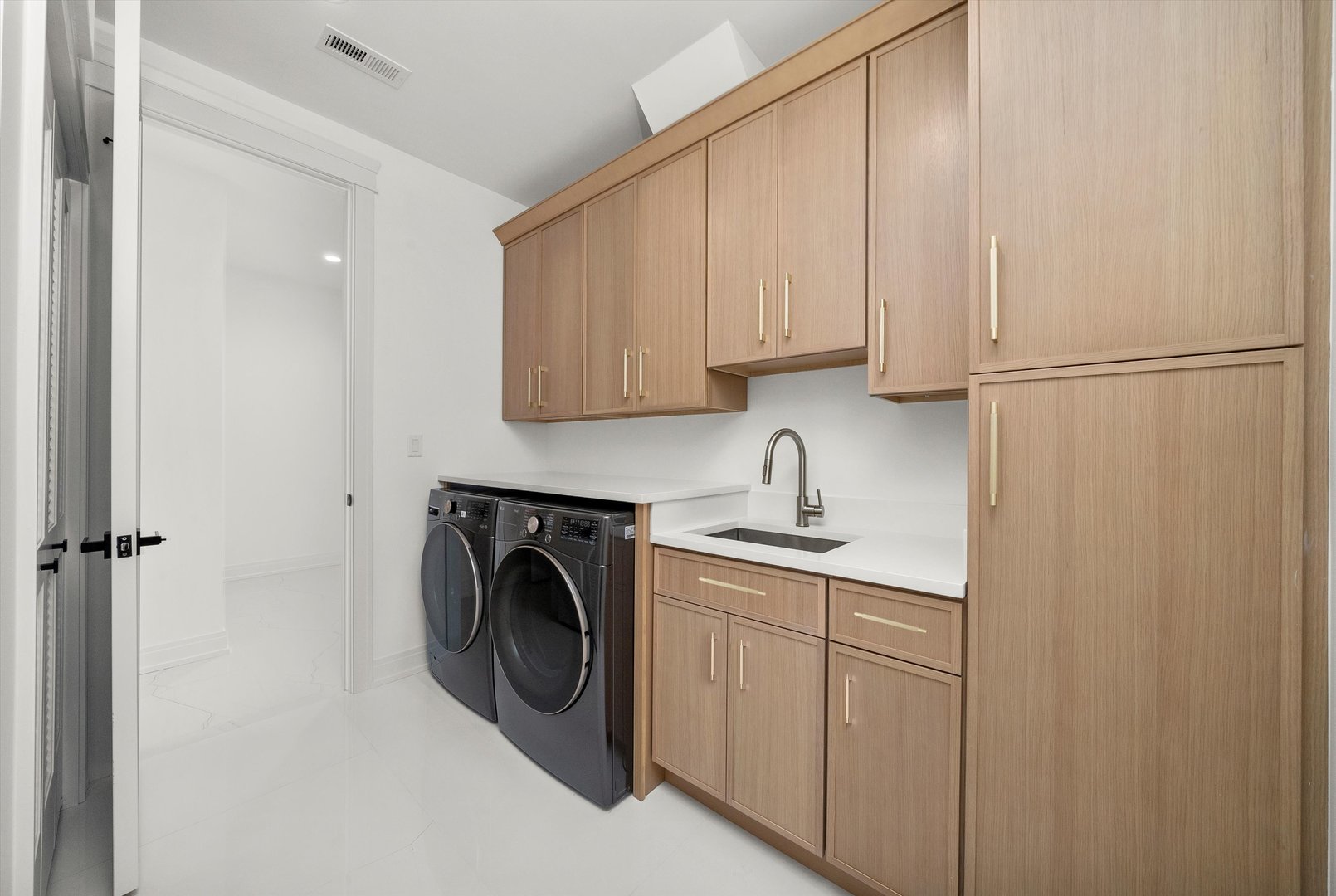 15W670 83rd Street Burr Ridge, IL 60527 - Photo 68 of 96 a utility room with sink dryer and washer