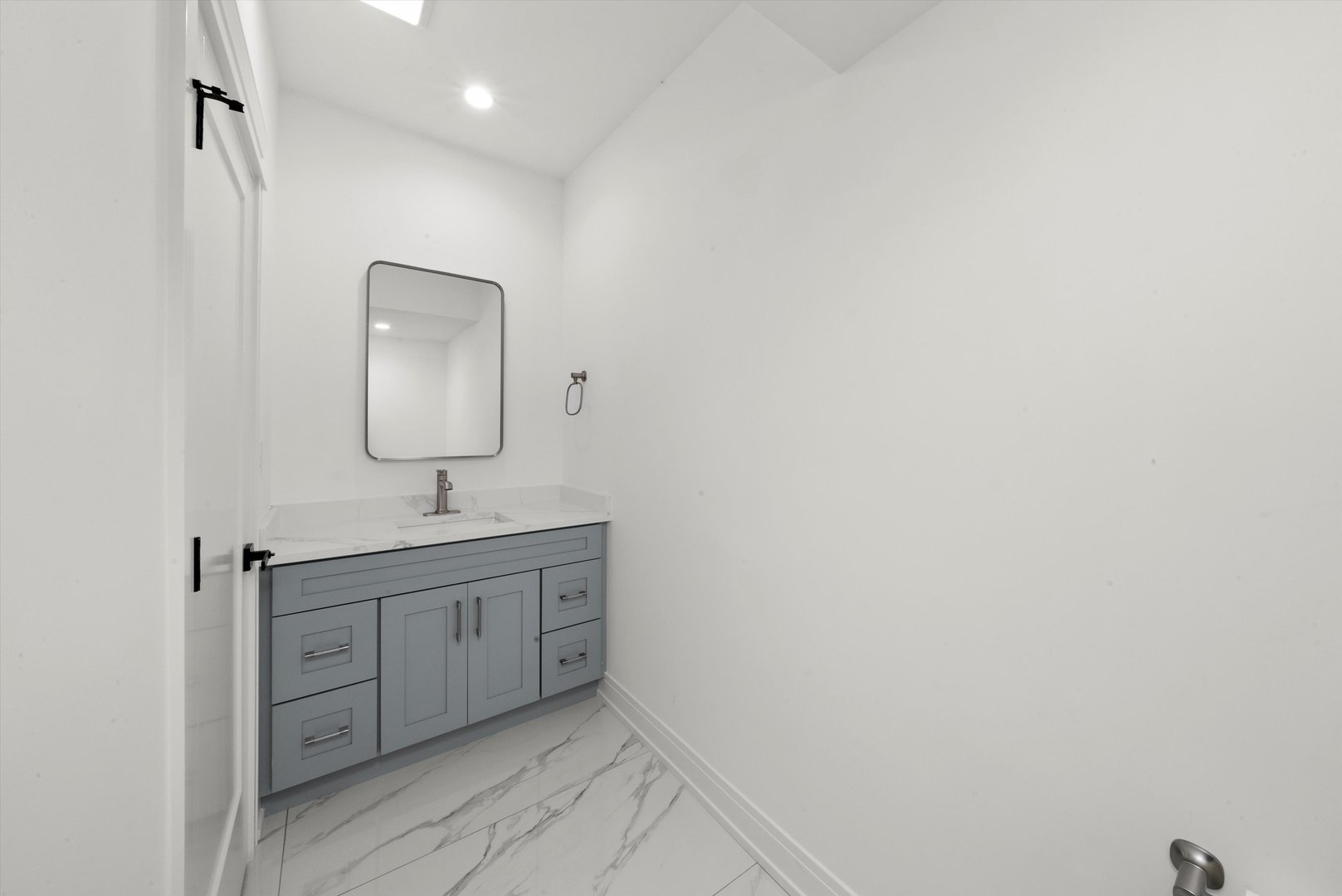 15W670 83rd Street Burr Ridge, IL 60527 - Photo 76 of 96 a bathroom with a double vanity sink and mirror