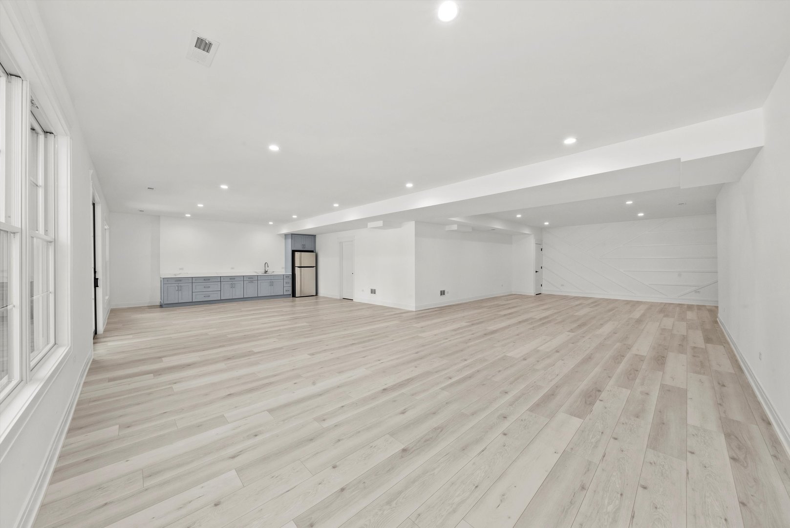 15W670 83rd Street Burr Ridge, IL 60527 - Photo 80 of 96 a view of empty room with wooden floor and windows