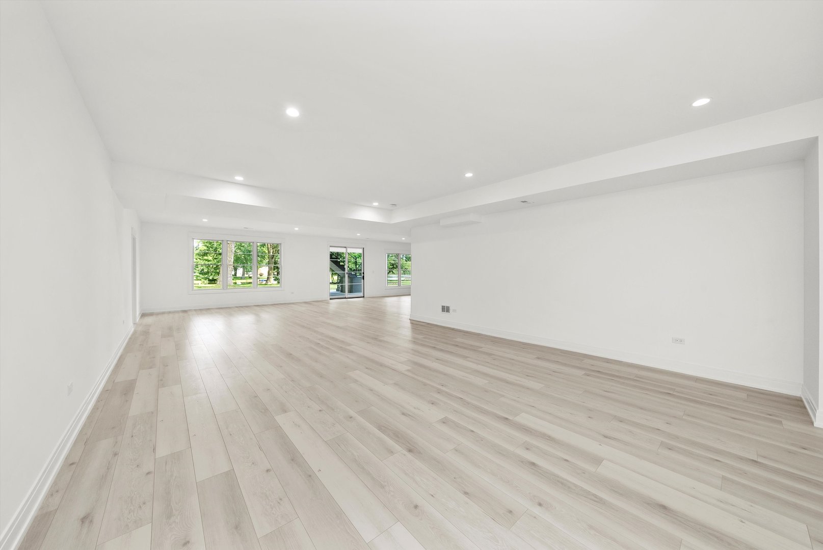 15W670 83rd Street Burr Ridge, IL 60527 - Photo 82 of 96 an empty room with wooden floor and window