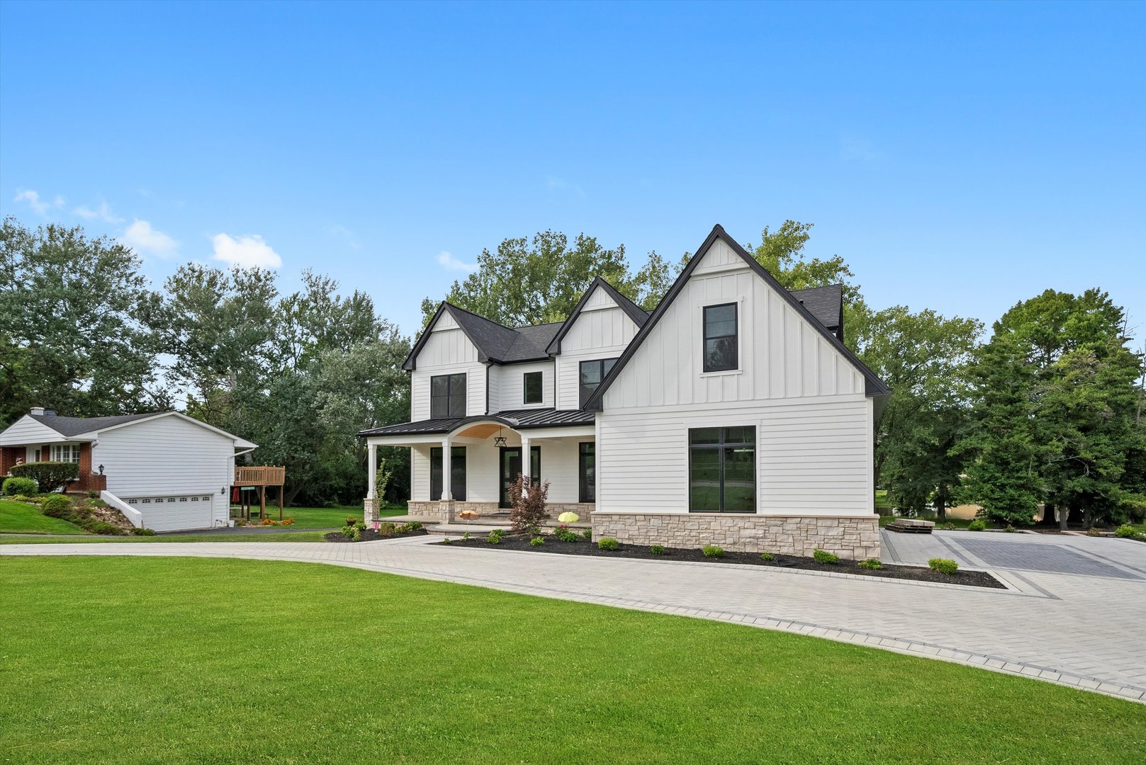 15W670 83rd Street Burr Ridge, IL 60527 - Photo 98 of 108 a front view of a house with a yard