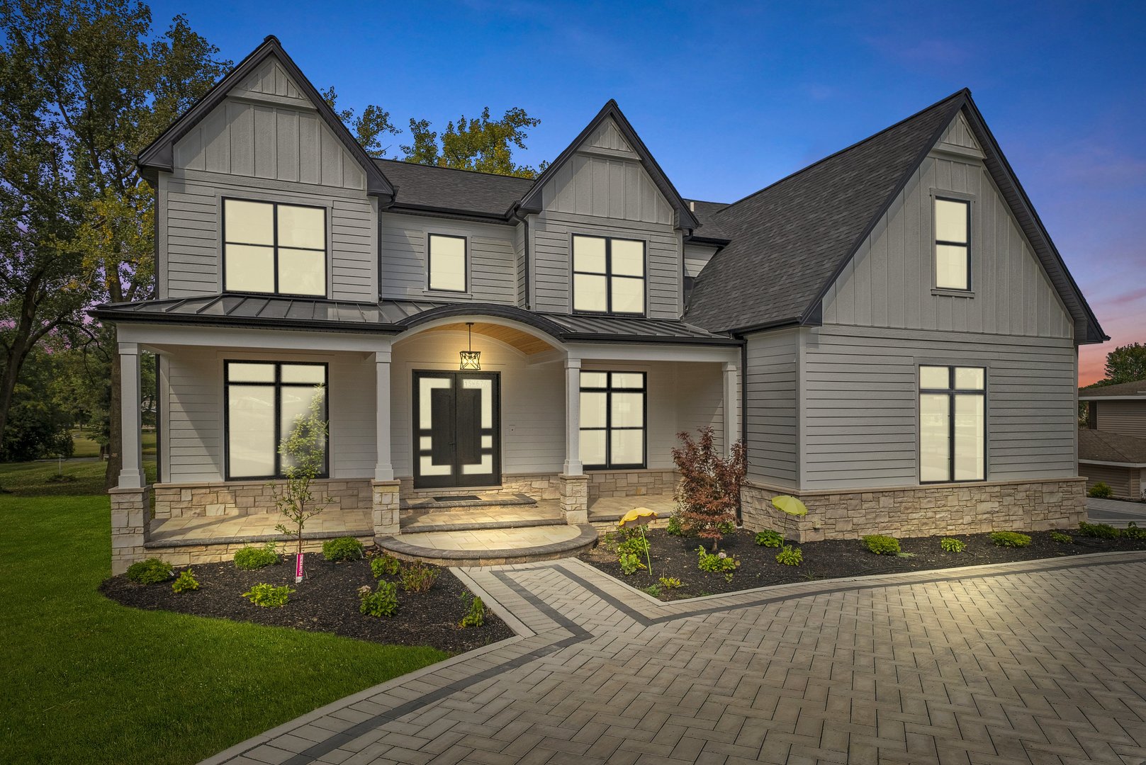 15W670 83rd Street Burr Ridge, IL 60527 - Photo 10 of 96 a front view of a house with garden