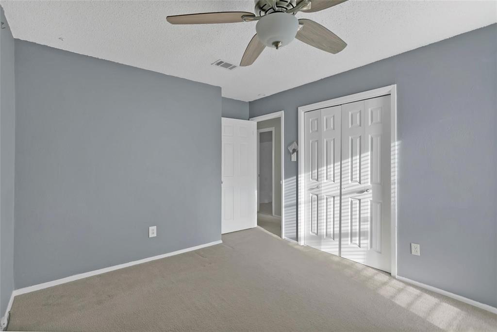 6104 Kelly Elliott Road Arlington, TX 76001 - Photo 9 of 25 a view of an empty room and a window
