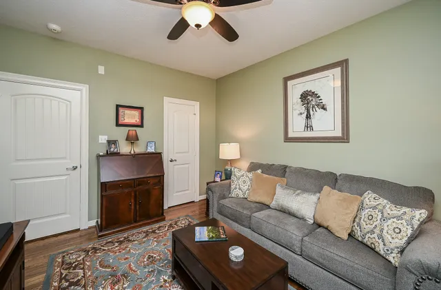 a bedroom with bed and window