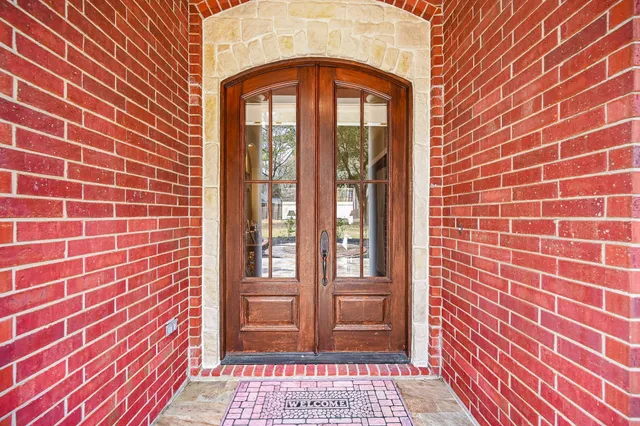 a view of a brick house with a door