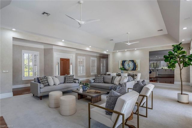 an aerial view of a house with a lake view