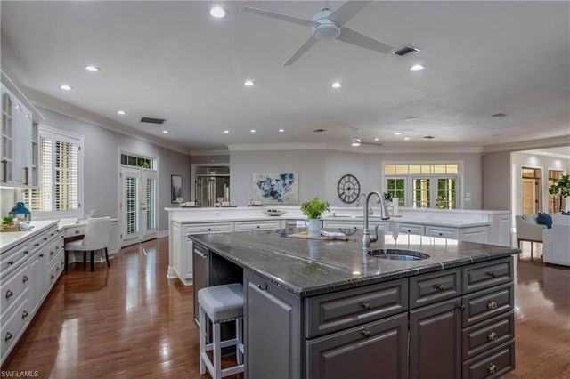 a view of a dining room with furniture and window