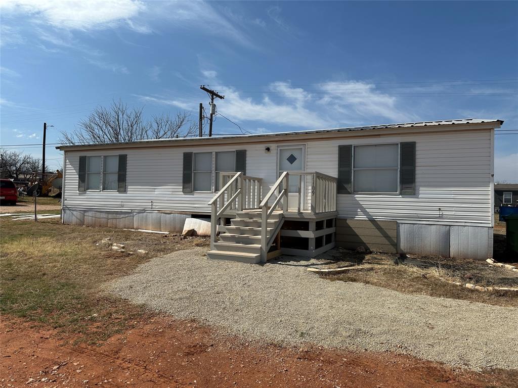 a view of a house with patio