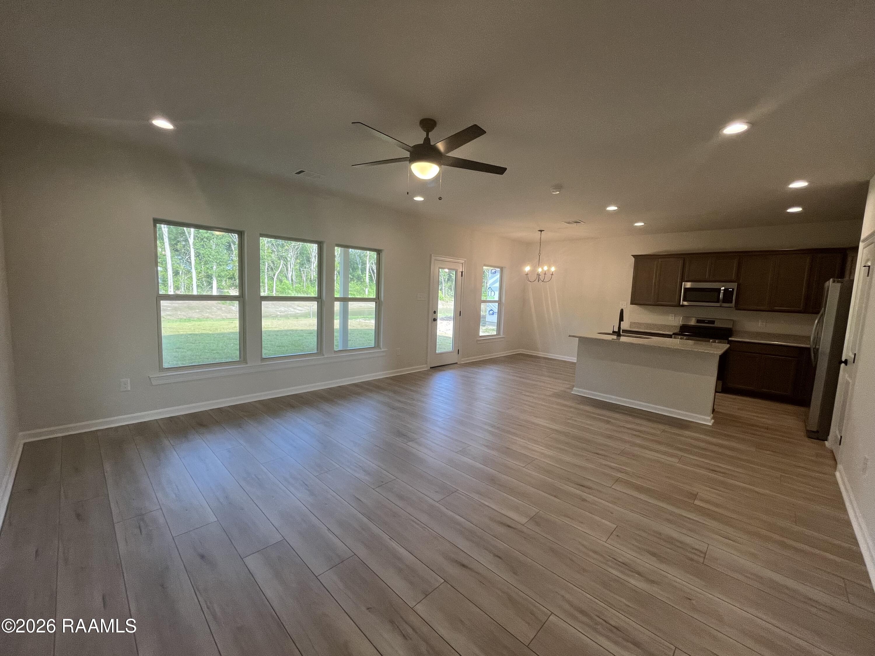 202 Rushfield Duson, LA 70529 - Photo 2 of 7 Living, Dining and Kitchen