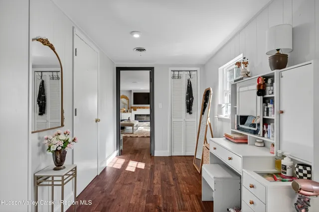 a room with furniture and wooden floor