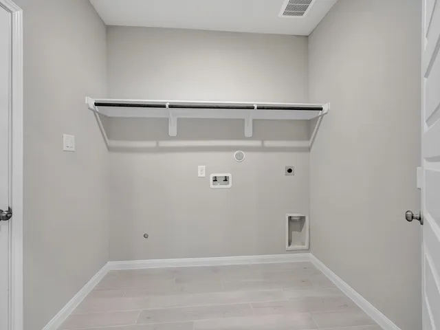 a view of an empty walk in closet