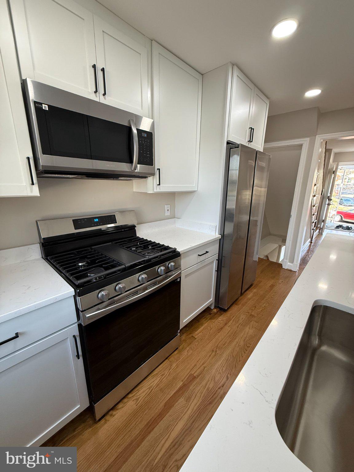 1608 13th Road South Arlington, VA 22204 - Photo 12 of 16 Modern kitchen with sleek finishes.