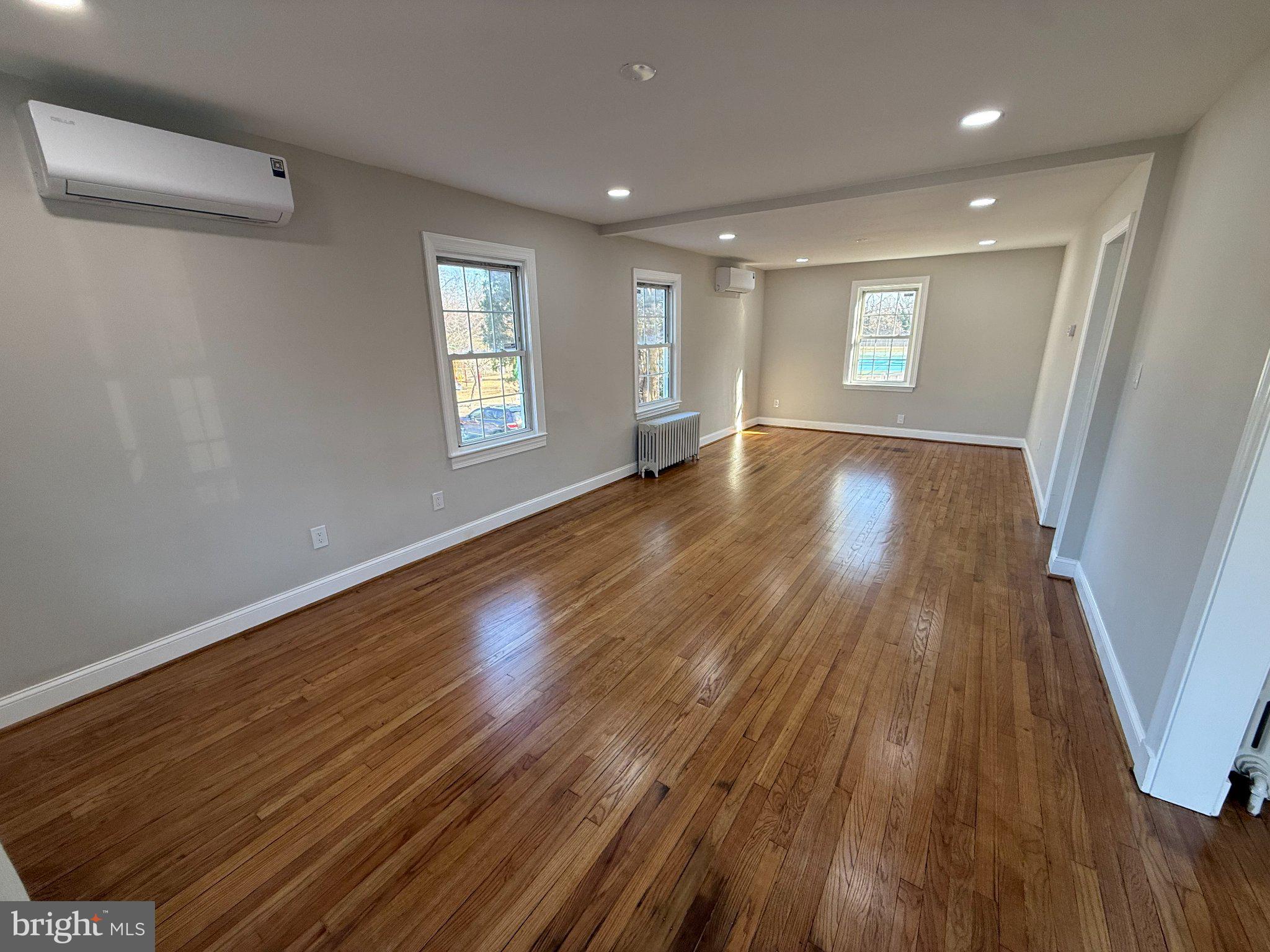 1608 13th Road South Arlington, VA 22204 - Photo 14 of 15 Spacious, sunlit living area awaits.