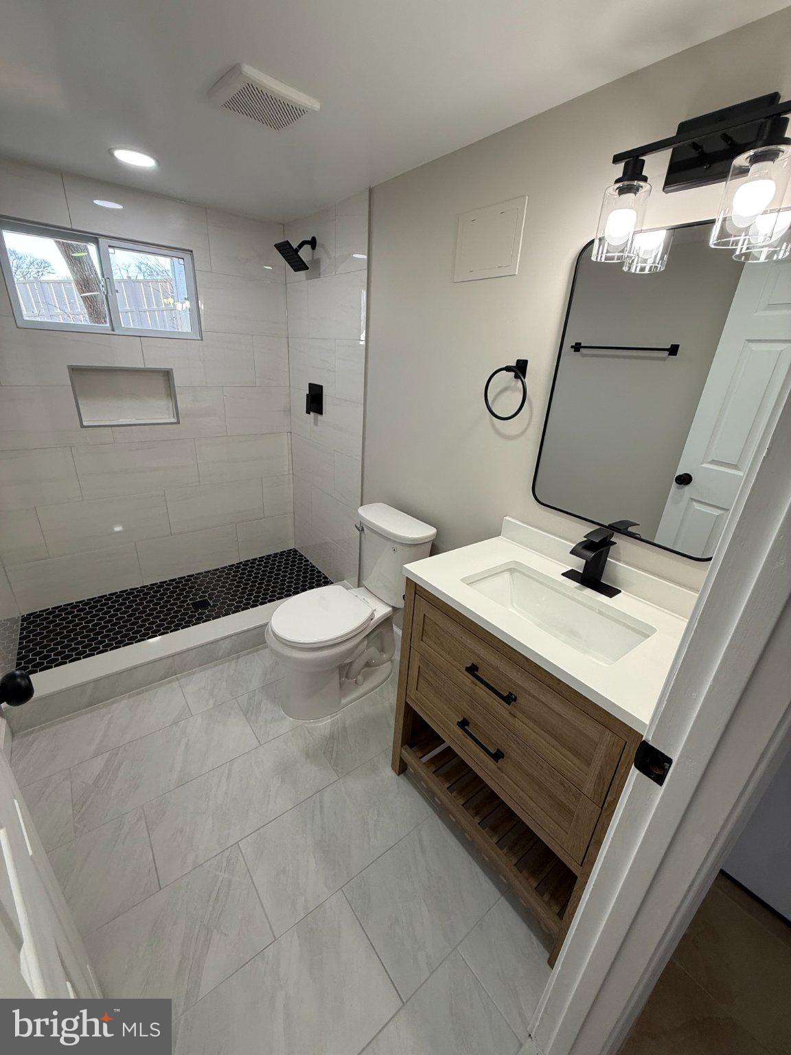 1608 13th Road South Arlington, VA 22204 - Photo 10 of 16 Modern bathroom with sleek finishes.