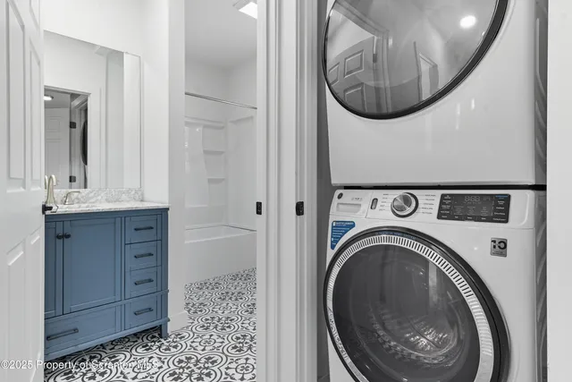 a view of washer and dryer in a bathroom