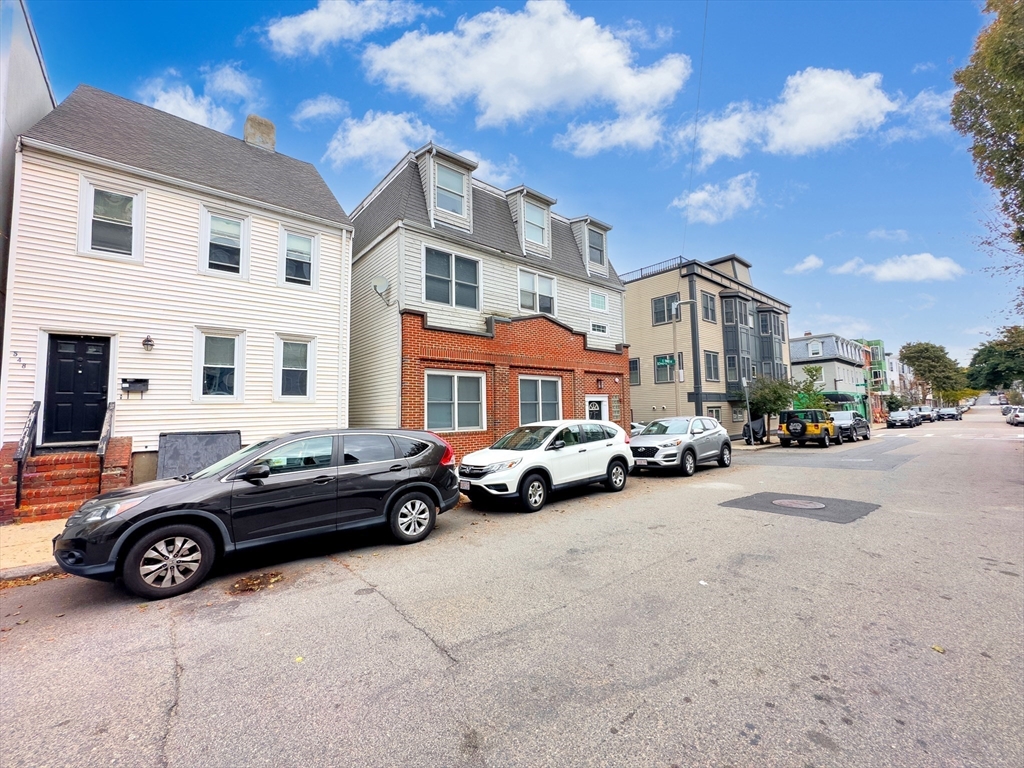 550 East 3rd Street Boston, MA 02127 - Photo 3 of 12 a car parked in front of a house