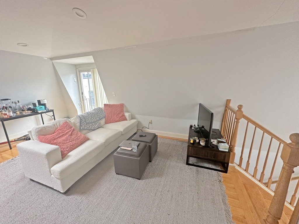 550 East 3rd Street Boston, MA 02127 - Photo 5 of 12 a living room with furniture
