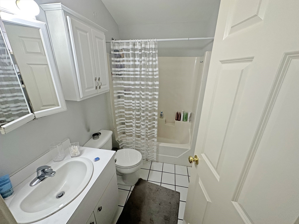 550 East 3rd Street Boston, MA 02127 - Photo 7 of 12 a bathroom with a sink toilet and shower